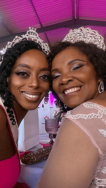 Princess Nakedi smiling with a community member at a foundation gathering